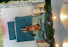 Monika fox poses naked on the bed.