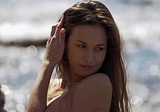 demi fray undressing and teasing nude on beach with ripped clothes