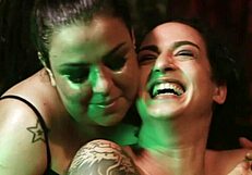 mayanna rodrigues and tormenta cosmica explore bdsm submission with strapon toys in a night club. teasing latex fetish.