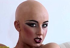 check out bald luca bella rocking a hot latex corset with stockings