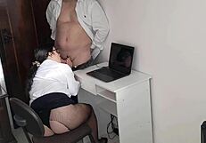 naughty secretary gives blowjob in miniskirt