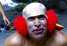 Chained Hot Brunette Fucked Hard by Clown in Wild Outdoor Scene