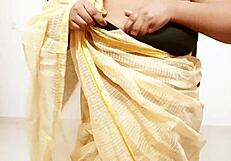 Chubby asian aunty showing boobs.