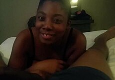 black ebony woman in a stunning black outfit