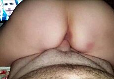 Amateur rides his cock passionately during football game sex tape