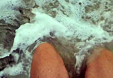 Missspisss shows big cock on Mallorca beach in public