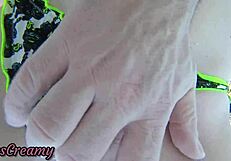 Teen student swims in the public pool with friends nearby