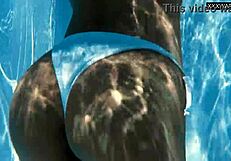 The best MILF of all time, Angelica, swims naked in the pool