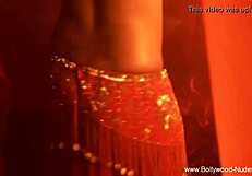 A sexy belly dancer from the Far East performs and teases for fun