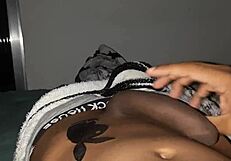 A young European man with a large penis gets a tattoo while ejaculating