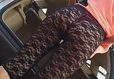 lingerie-clad babe on outdoor adventure with cream tube and peeing in nature