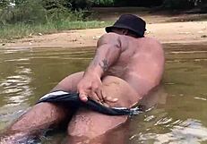 I enjoyed a relaxing river bath with my partner outdoors.