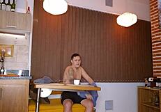 A brunette wife cheats on her husband with a young neighbor, gagging on his cock and achieving orgasm in a homemade scene.