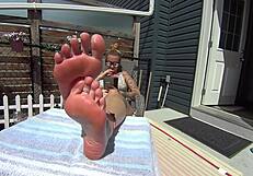 bikini babe with blonde girlfriend shows feet and toes in fetish play