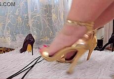 Hotwife's bare feet and red toenails in high heels