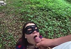 Brunette gets a big cock in her mouth in the woods and gets a facial
