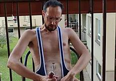 Solo balcony scene with masturbation and dildo action