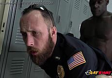 Horny gay cops bang black suspect in locker room!