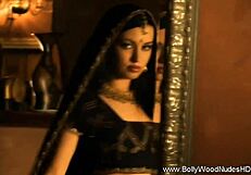 brunette babe dances nude to music