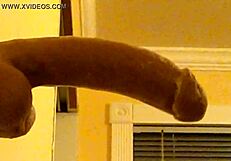 Can you believe this gay guy in hood deepthroating that dildo?