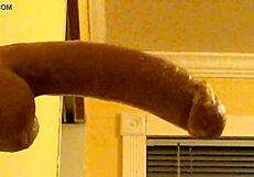 Can you believe this gay guy in hood deepthroating that dildo?