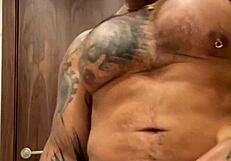 what's viktor rom doing with his big black cock? massive latino muscle man in a cage