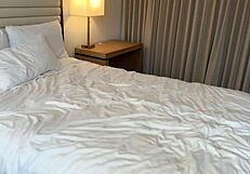 Big Titty Coworker Rejects Condom in Business Trip Hookup