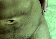 Gay dude cums hard while playing with his navel!