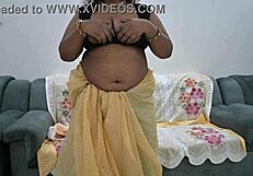 Married Indian woman in a saree exposing her breasts