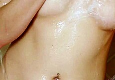 Beautiful blonde takes a shower and gets a hot massage with oil