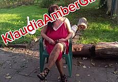 klaudiaambergirl relaxes outdoors in peaceful setting