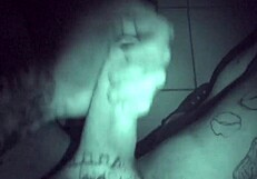 Late night solo session with tattooed performer in quiet room