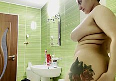 Hot Tattooed Woman with Big Tits Masturbating in Shower