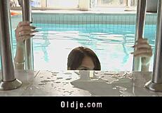 sweet redhead teen sucking old cock at pool 😍