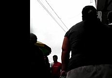 I watch my peruvian neighbor doing her shopping.