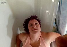 Liza enjoys a golden shower and a messy cumshot