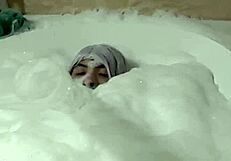 Cyno Model in Cosplay Costume Enjoys Solo Bubble Bath