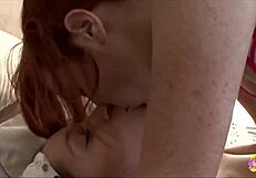 Hot redhead lesbian licks and fingers her skinny friend to orgasm