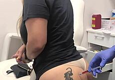 Blonde client with butt tattoo receives injection during spa massage session 2, watched voyeuristically
