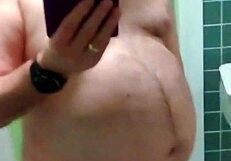 Wow, check out this naked wanking action with a hard cock in full view!