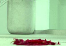 Solo girl enjoys foot fetish with crushed fruits and heels