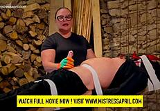 Dominatrix Mistress April torments slave on special prison bed with electro shocks.