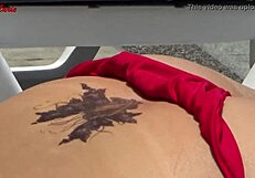 Sexy babe jennymarie flashes wet bikini tits in public outdoor exhibition