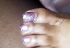 toes teasing a cock with footjob action