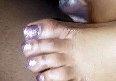 toes teasing a cock with footjob action
