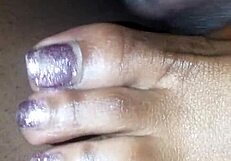 toes teasing a cock with footjob action