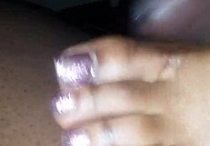 toes teasing a cock with footjob action