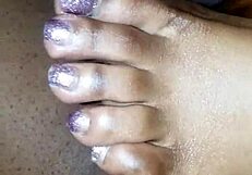 toes teasing a cock with footjob action