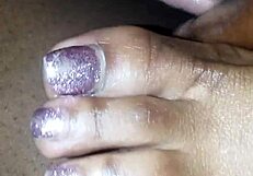 toes teasing a cock with footjob action