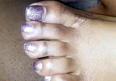 toes teasing a cock with footjob action